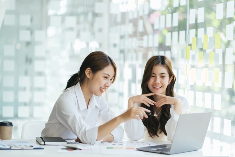 Virtual Medical Receptionists two doctors watching medical records in laptop