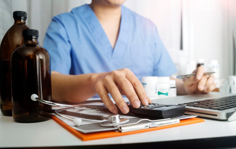 Medical technology concept The doctor works with mobile phones, headphones and tablets