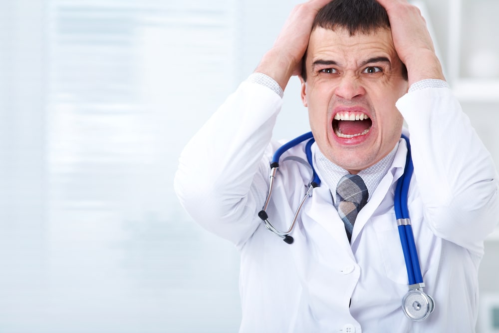 Portrait of male doctor having bad news