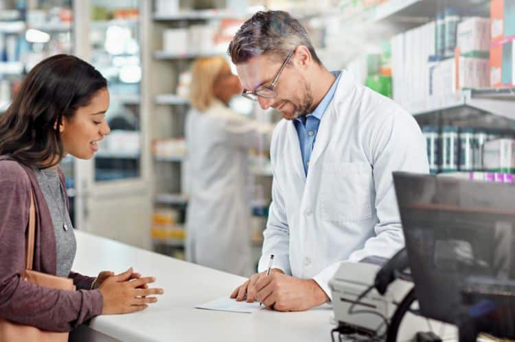 authorization pharmacist checking the prescription