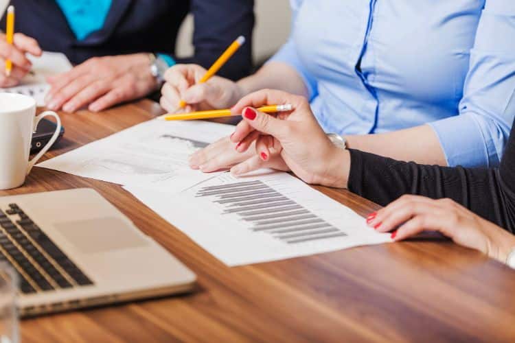 health insurance company setting at desk working