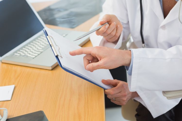 medical records two doctors in a meeting