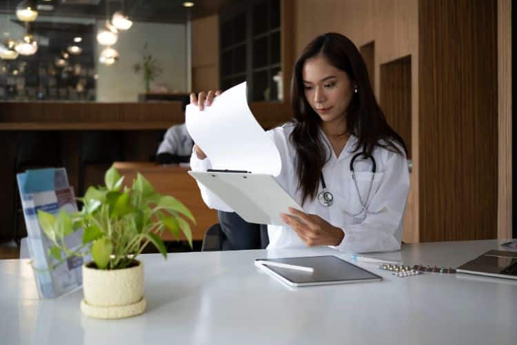 nurse remote assistant checking with the documents