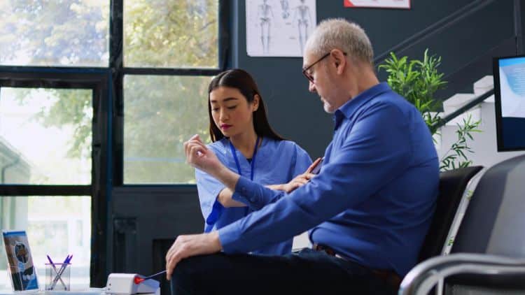 referral and a prior authorization a man being checkup by a nurse