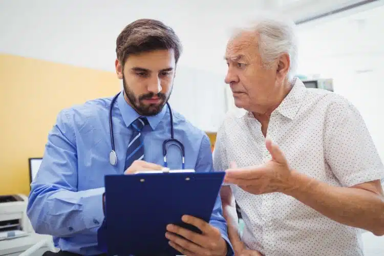 prior authorization doctor consulting a patient