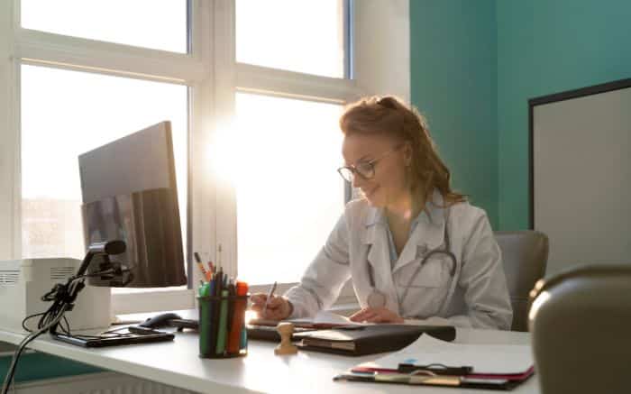 exploring authorization solutions in the healthcare field female doctor sitting