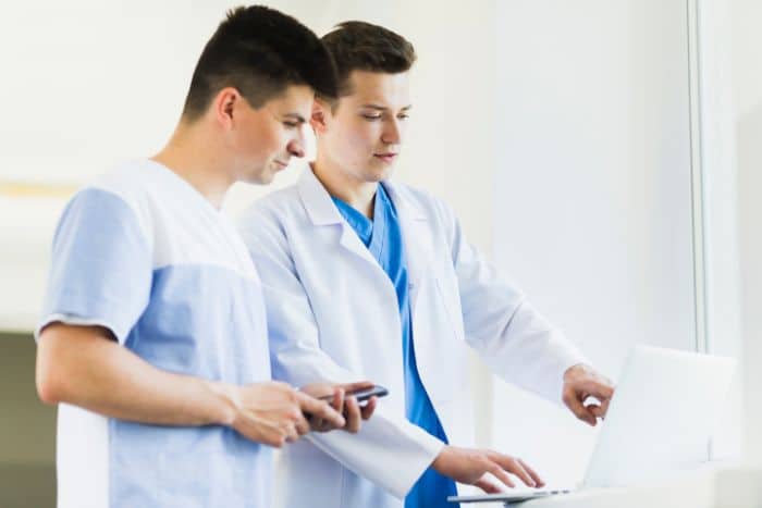 preauthorization service benefits 2 male doctors