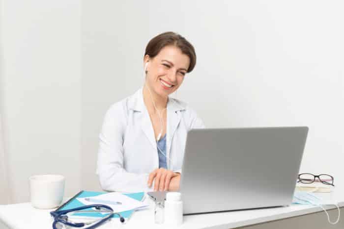 strategic imperative of reviewing and updating prior authorization policies video chatting female doctor