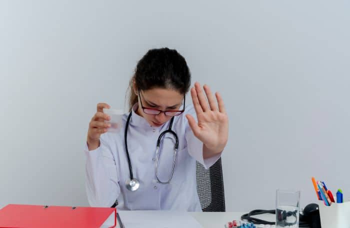 improving patient care by managing authorization denials unpleased young doctor