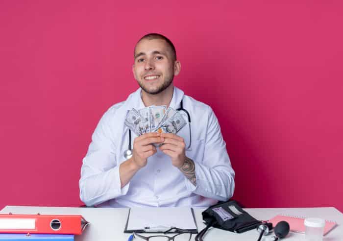 financial and human costs of prior authorization in healthcare smiling young doctor