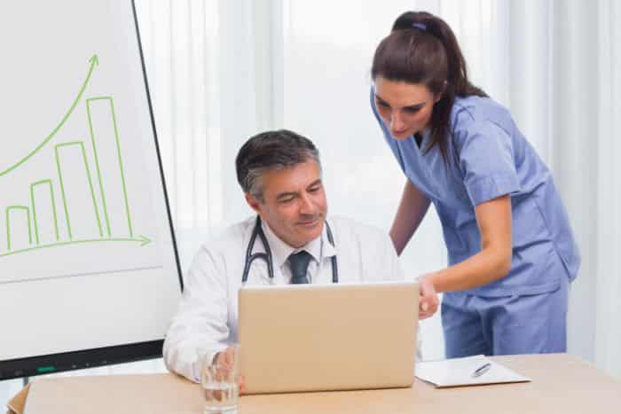managing patient cases with prior authorization services smiling doctor and nurse