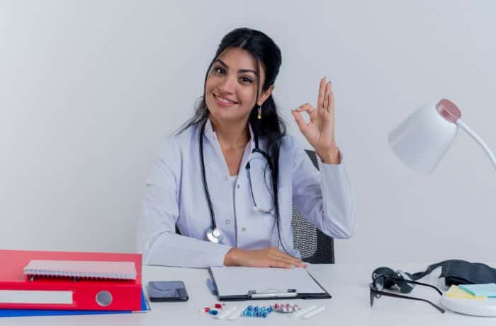 managing patient cases with prior authorization services smiling doctor