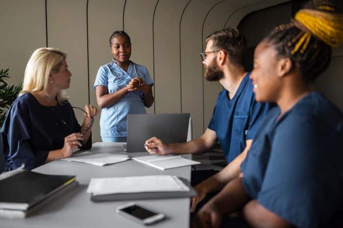 advocating prior authorization policy changes doctor and nurse meeting