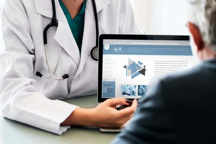 virtual medical assistants handling precertification doctor discussing patient