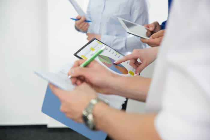 precertification services for private practices coworkers with papers