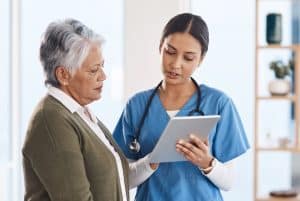 prior authorization and healthcare access, doctor talking to the patient