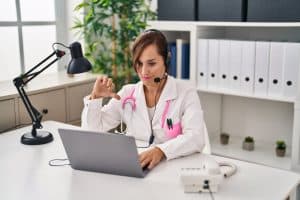 prior authorization and healthcare access doctor woman working wearing headset