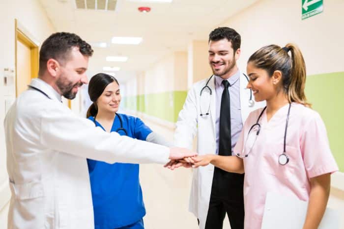 prior authorization insurance on patient care and accessibility confident male and female doctors