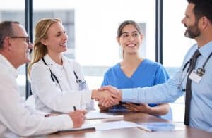 streamlining prior authorization doctor meeting and handshaking