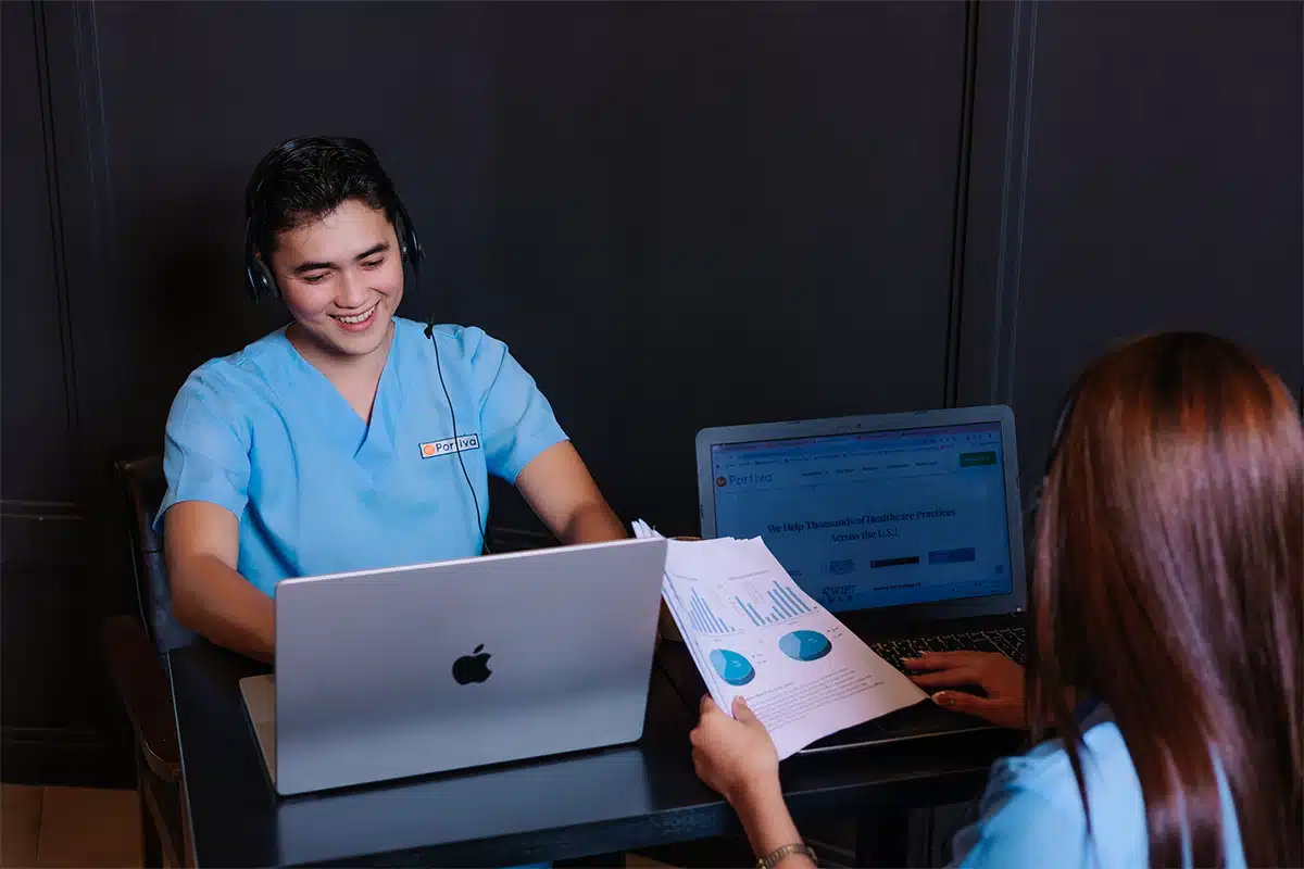 trends in prior authorization technology of portiva, male VA smiling using laptop