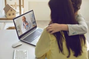 future of medical administration virtual medical receptionists, doctor talking to the patient