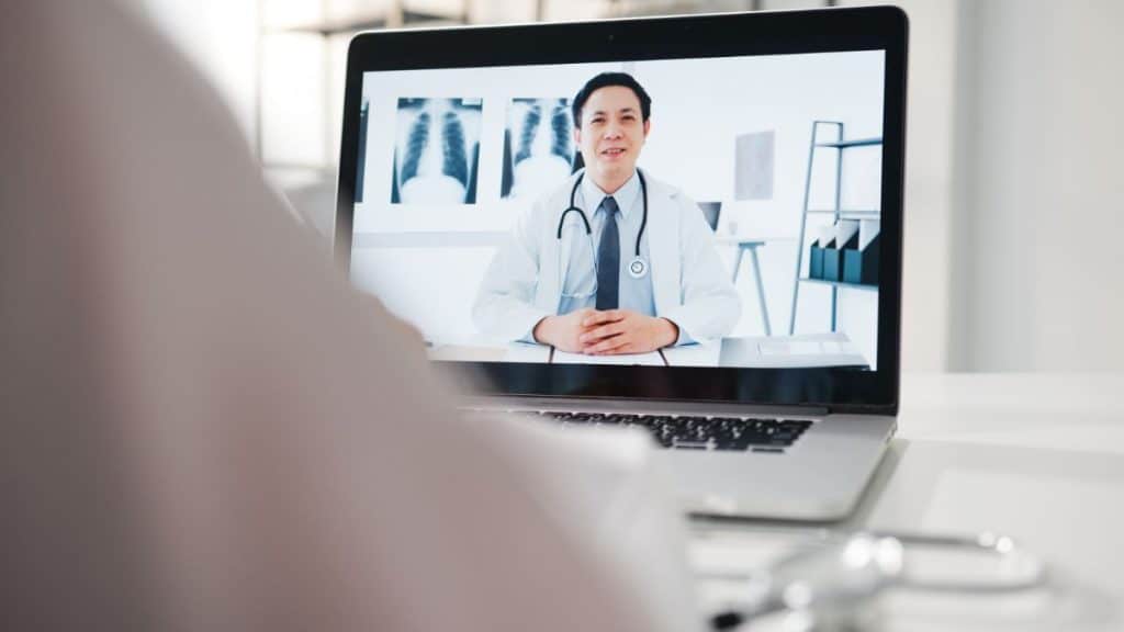 office efficiency with virtual medical receptionist, doctor on the screen