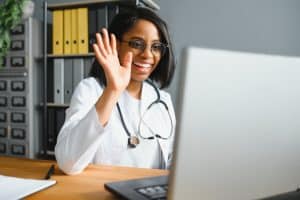 practice needs a virtual medical receptionist, doctor talking someone virtual