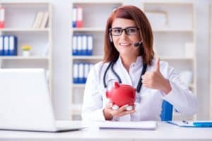 virtual medical receptionist expanding practice's VA doctor holding a piggy bank