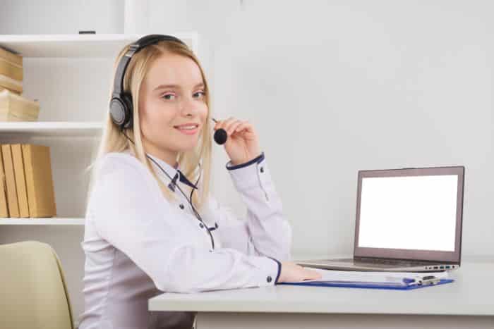 virtual medical receptionist female VA working at the office