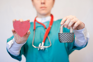 virtual medical receptionist solutions, doctor holding a lock and a heart