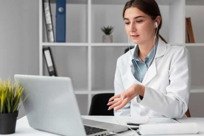 virtual medical receptionist solutions, female doctor talking to someone