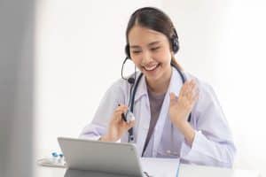 virtual medical receptionists are transforming healthcare, VA doctor holding a medicine