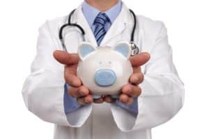 virtual medical receptionists are transforming healthcare, doctor holding a piggy bank