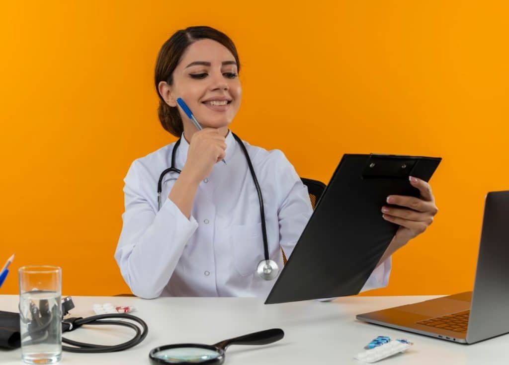 virtual medical receptionists handle multitasking, doctor holding a clipboard