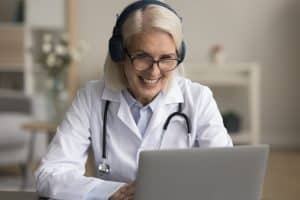 you need a virtual medical receptionist woman doctor using laptop