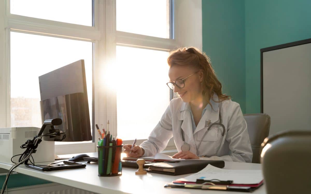 practice hours with virtual medical receptionist doctor working at teh desk