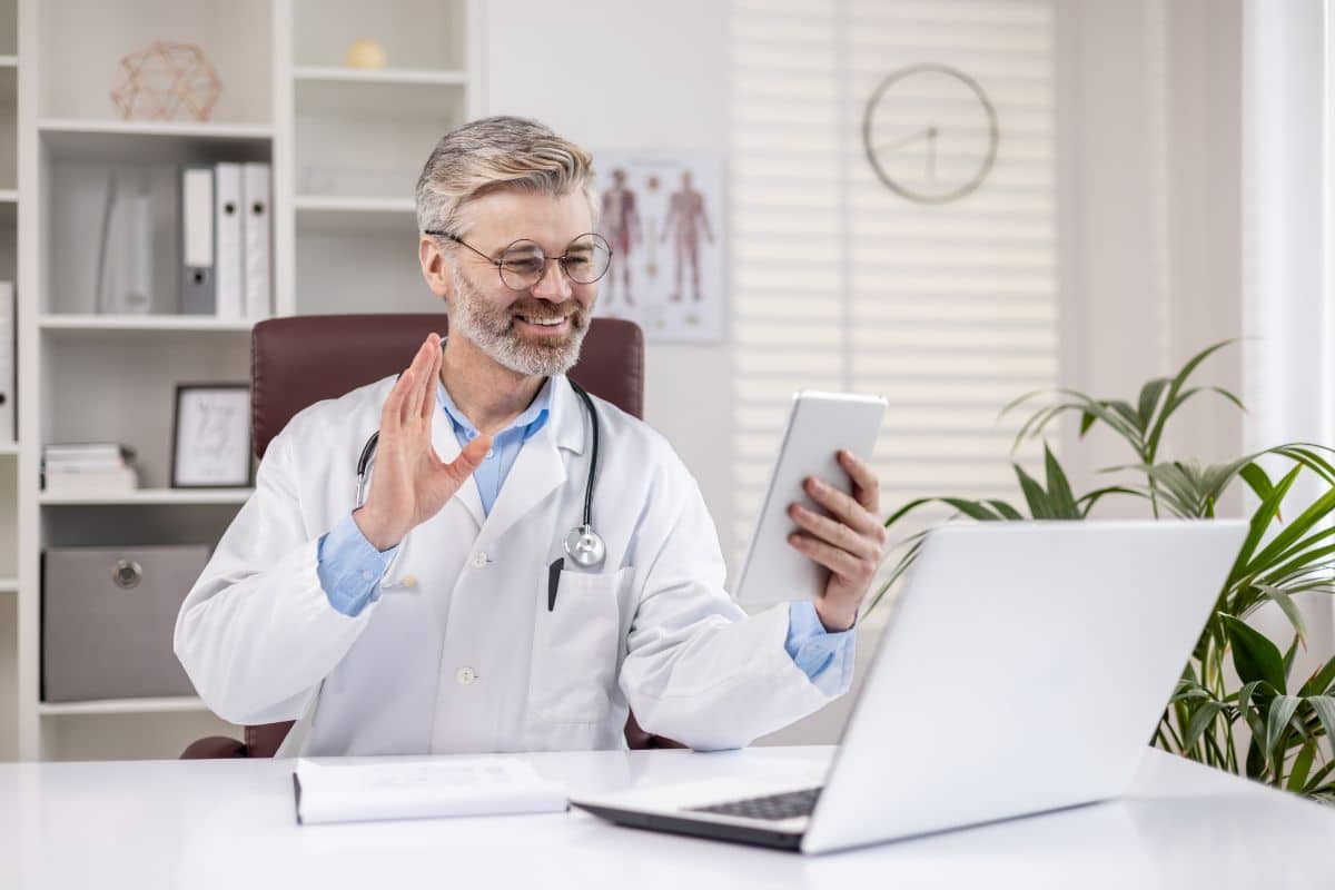 virtual medical receptionist responsibilities doctor talking to someone