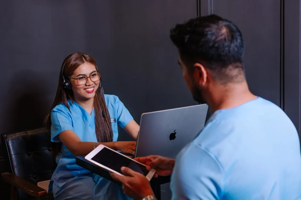 Virtual receptionist healthcare professional assisting a medical provider with patient communication and front-desk support
