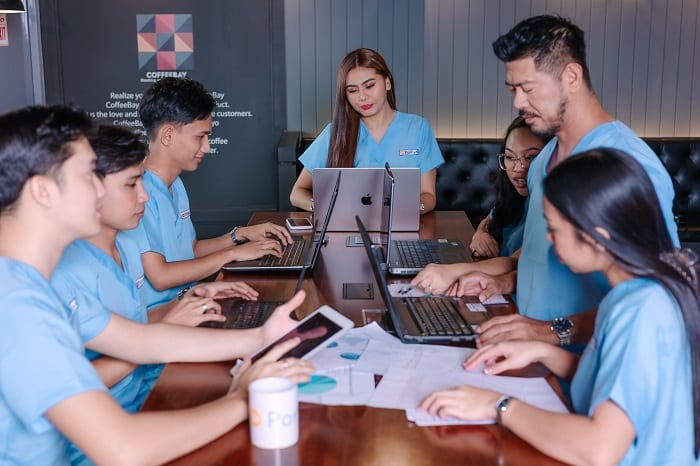 group of medical billers in a meeting
