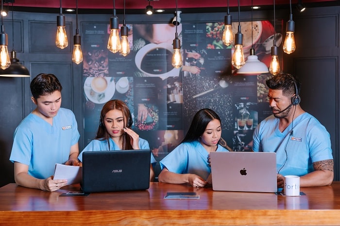 four virtual assistants are collaborating